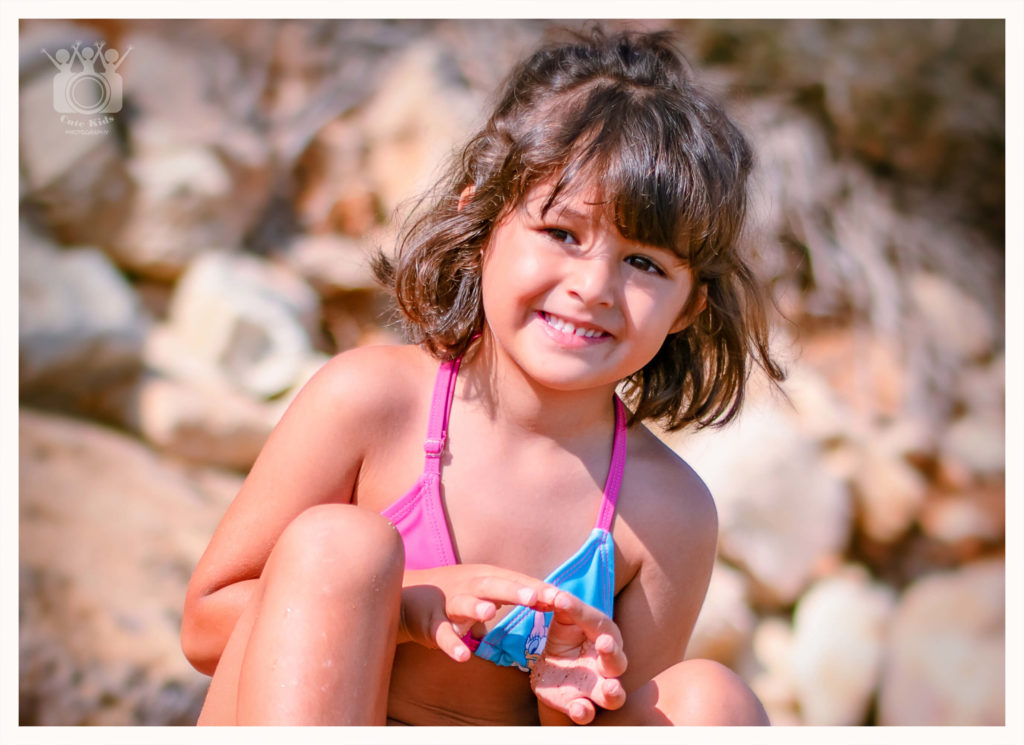 A little happy child on the beach Malta