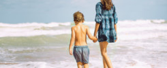 Beach photo shoot of family with kids by cute kids photography
